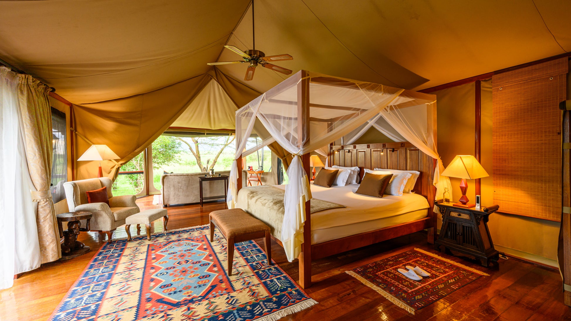 
A luxurious tented accommodation offering a picturesque view of the wildlife outside the Maasai Mara National Game Reserve.
